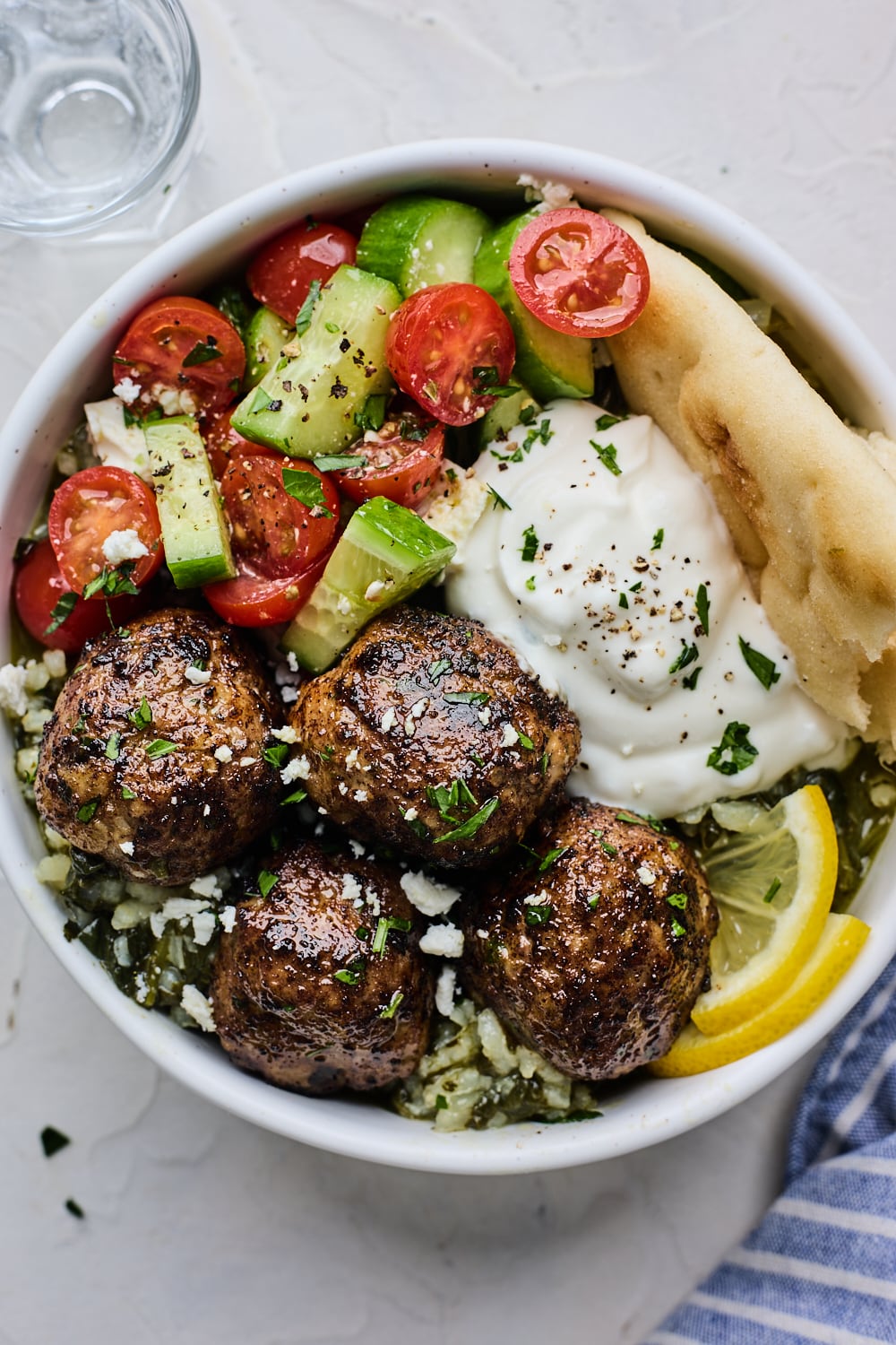 Greek Meatballs in a bowl with rice and veggies