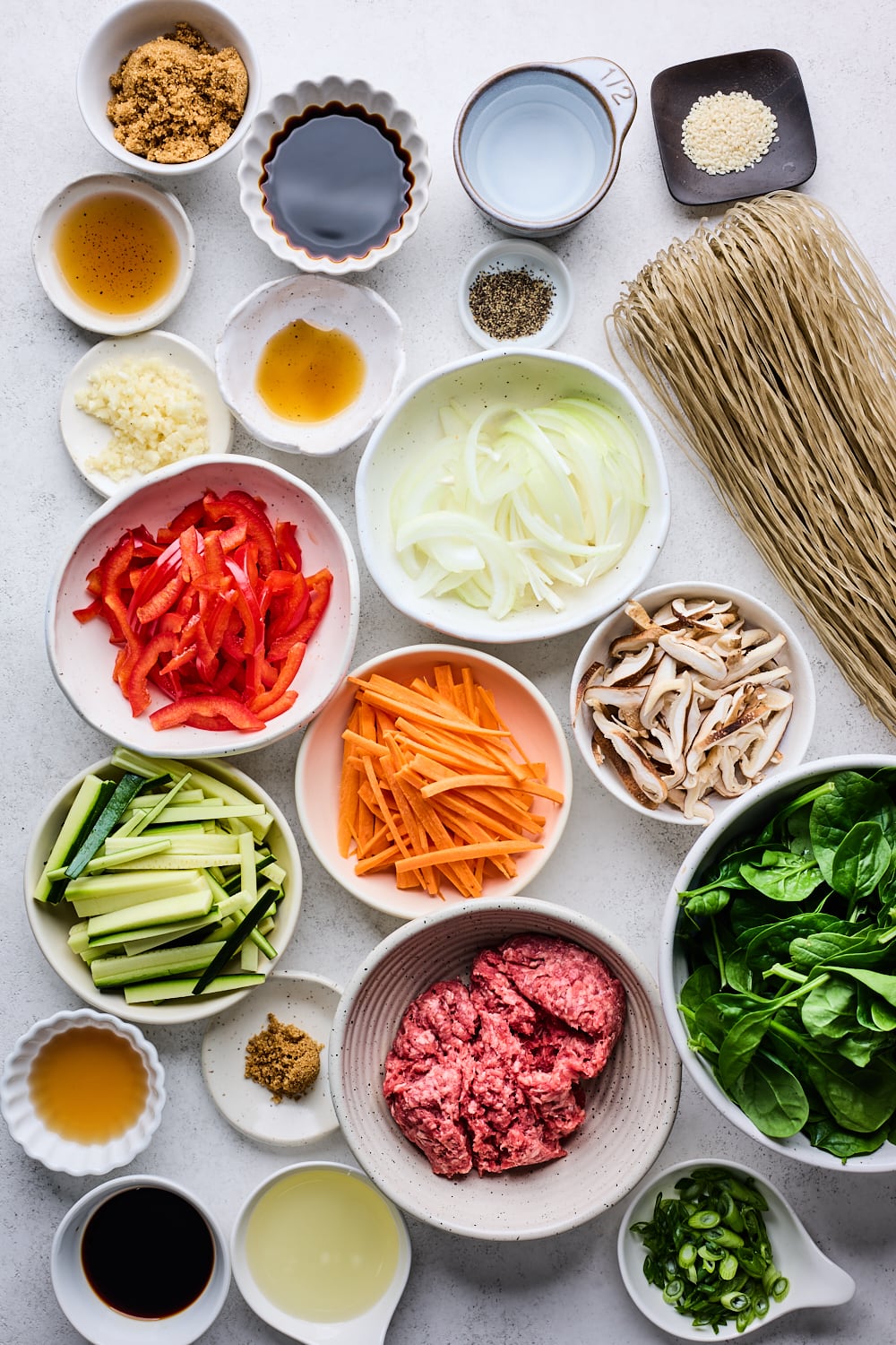 Japchae ingredients layed out on a table