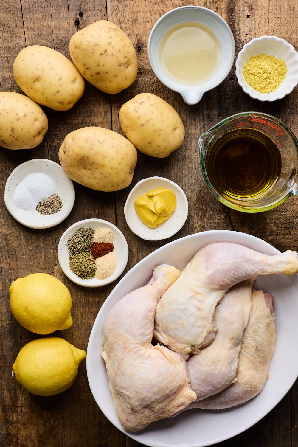 One Pan Greek Lemon Chicken and Potatoes Ingredients on a table