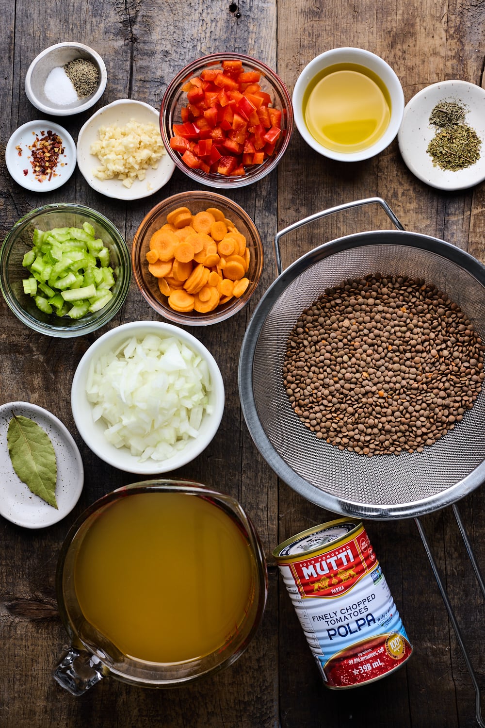 Greek Lentil Soup Ingredients on a wooden table